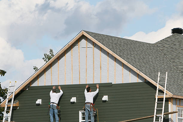 Professional Fiber Cement Siding technician working in Oak Park, IL